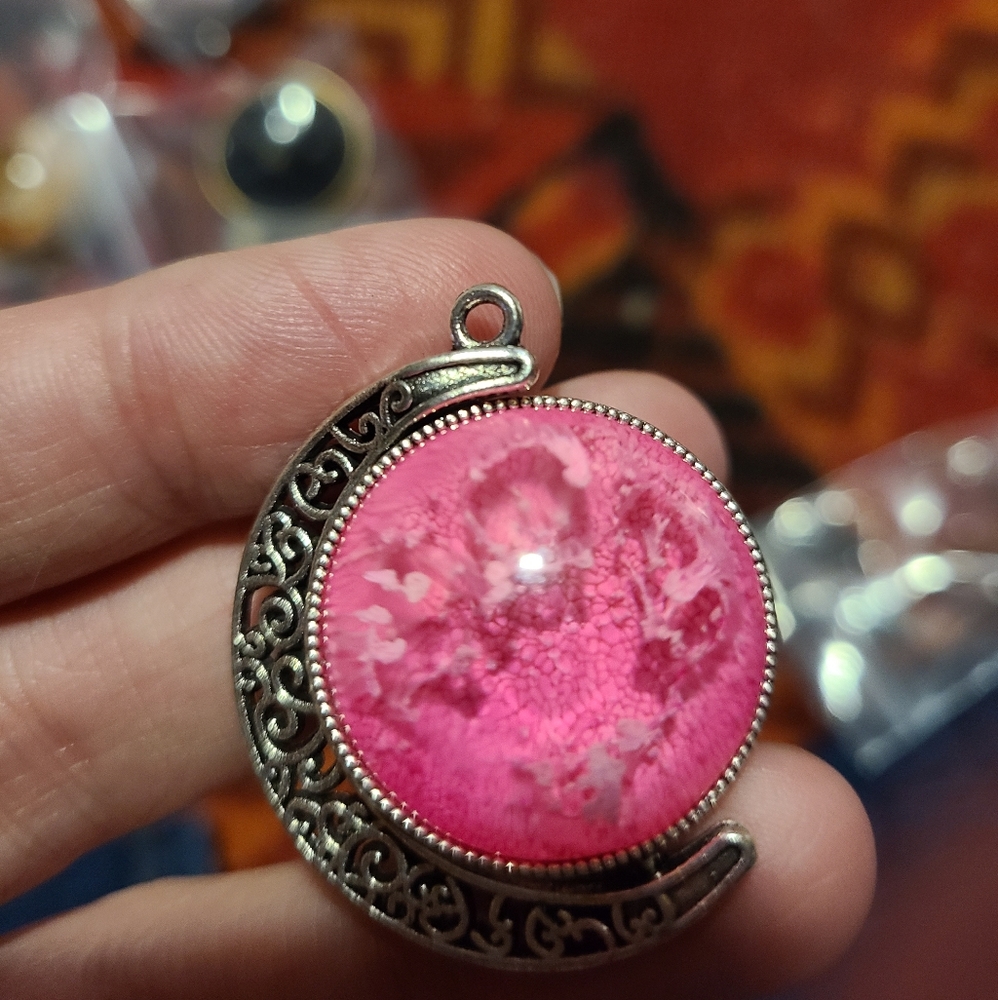 Double sided resin pendant